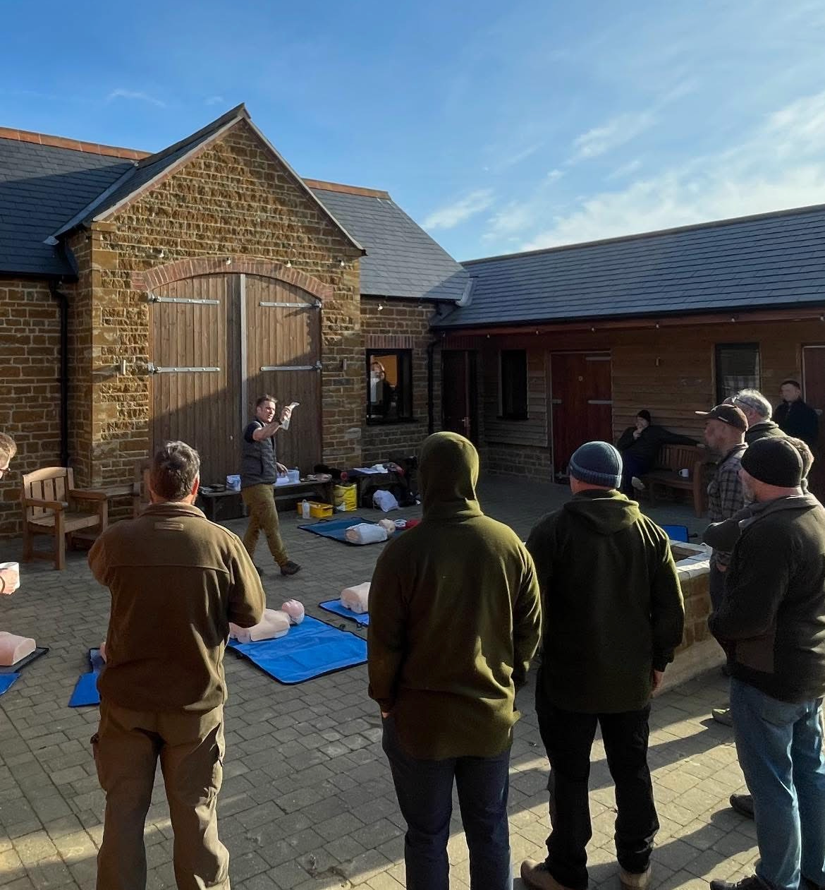 Participants taking part in a hands-on outdoor training session